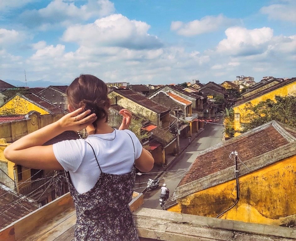 Outdoor Adventures In Da Nang, Vietnam: yellow alleyways with colorful lanterns in Hoi An