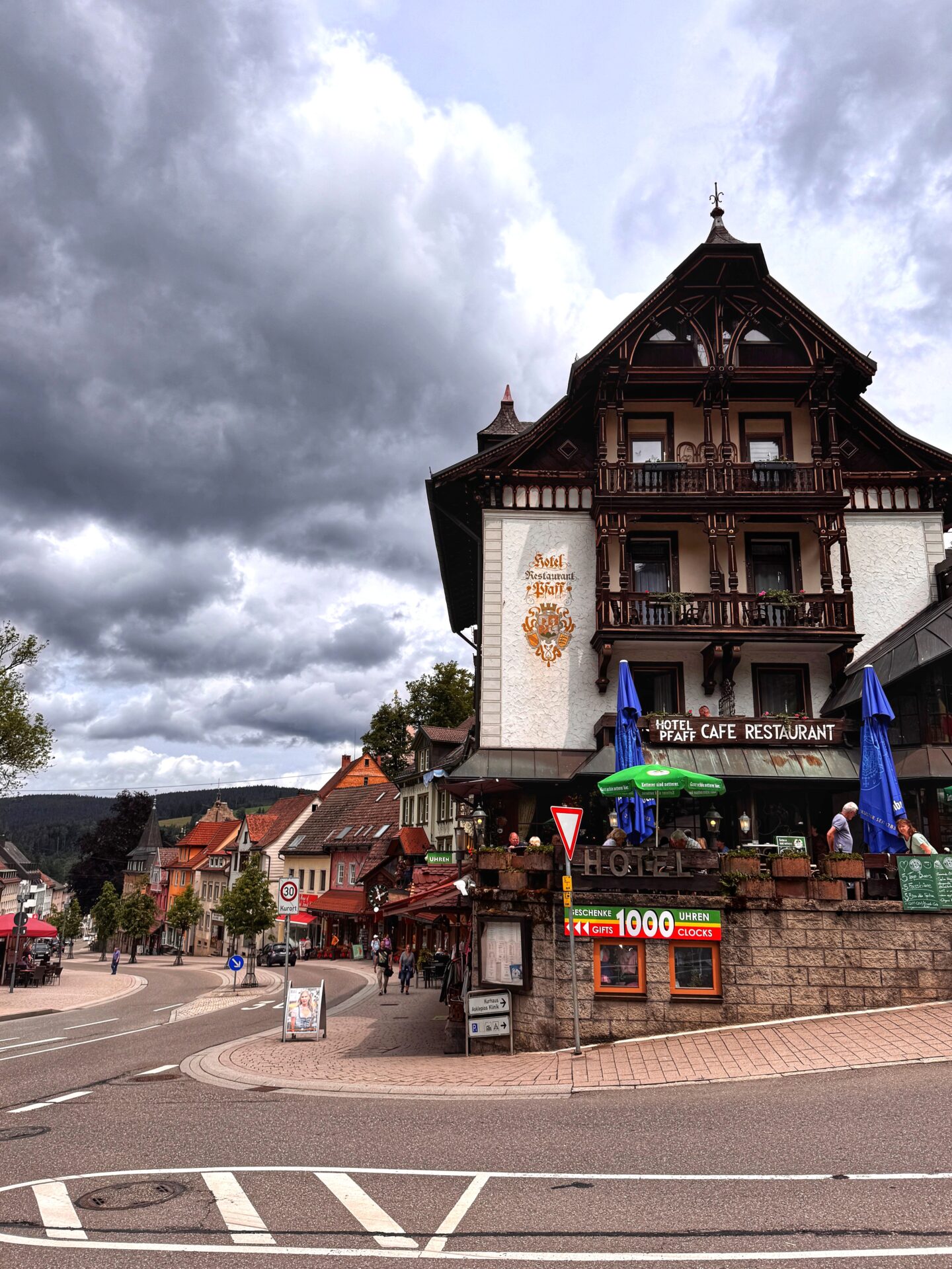 Traditional German hotel and café with timber-framed design on a charming street in Triberg in the Black Forest.