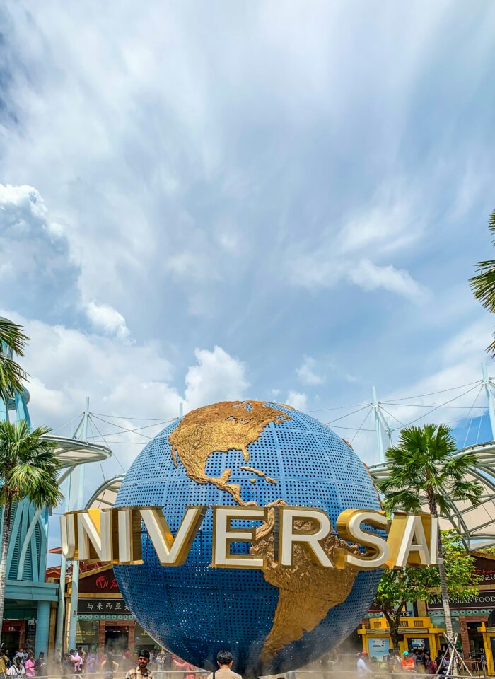 Iconic Universal Studios globe fountain at the entrance of Universal Studios Singapore.