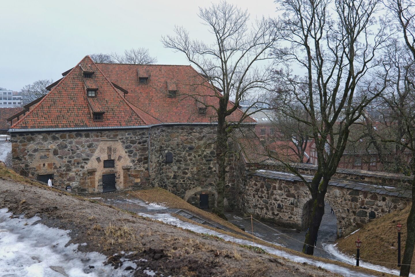 Historic stone walls of Akershus Fortress overlooking Oslo, Norway