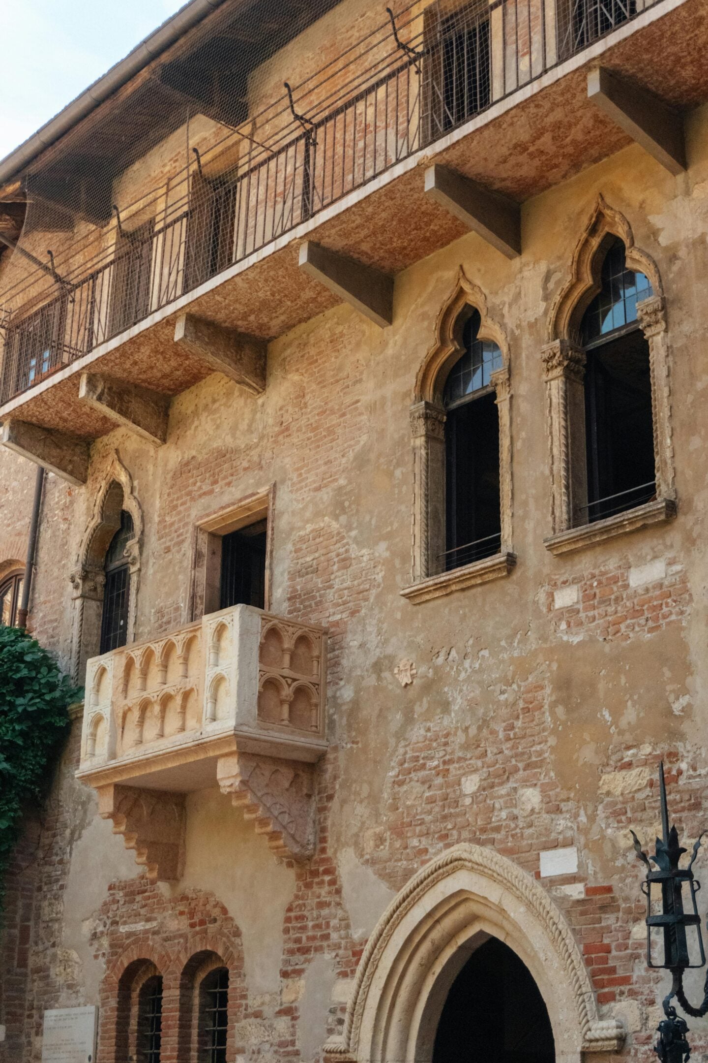 Juliet’s House balcony and medieval courtyard in Verona, Italy