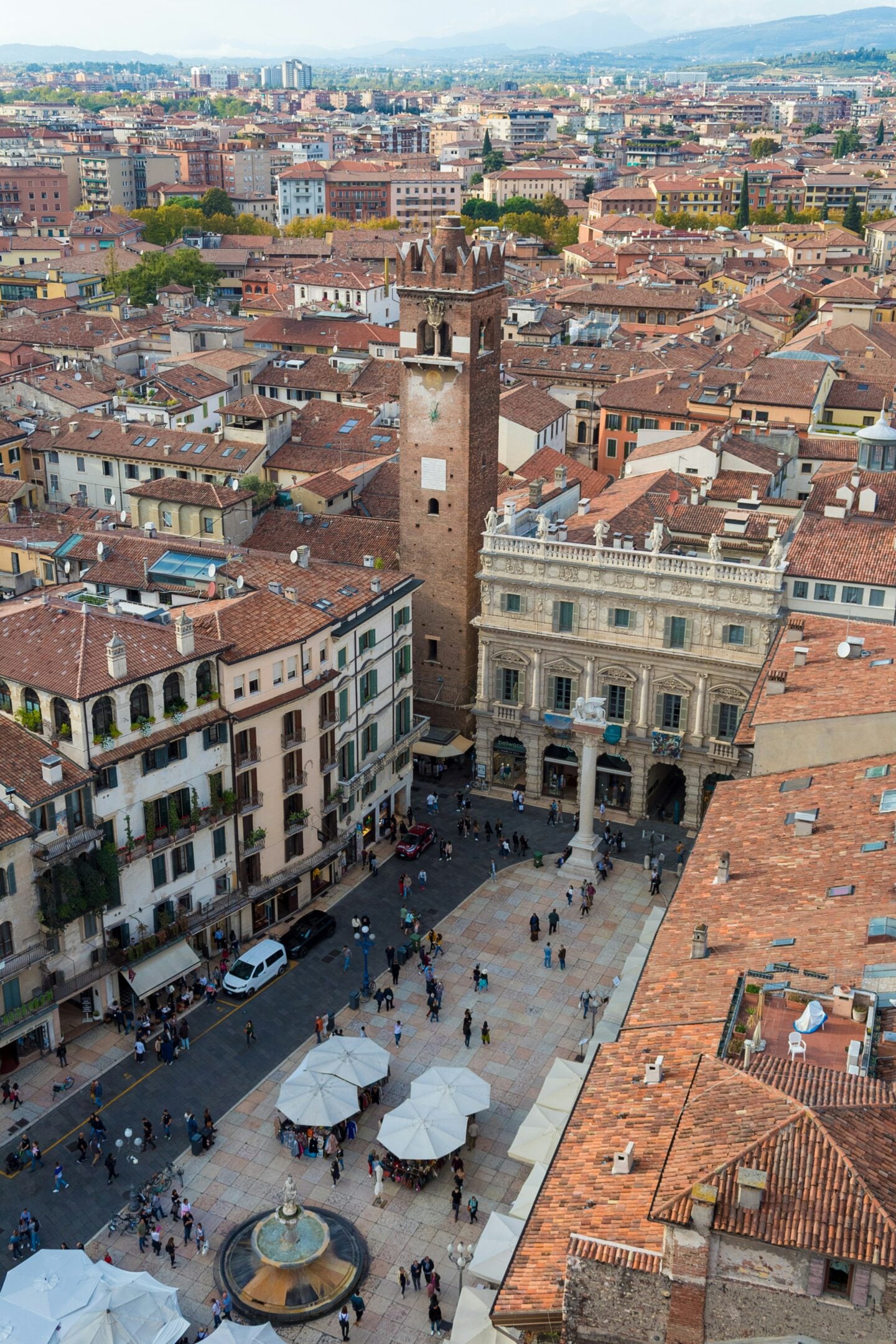 Aerial view of Piazza Delle Erbe with historic buildings and market square in Verona, Italy