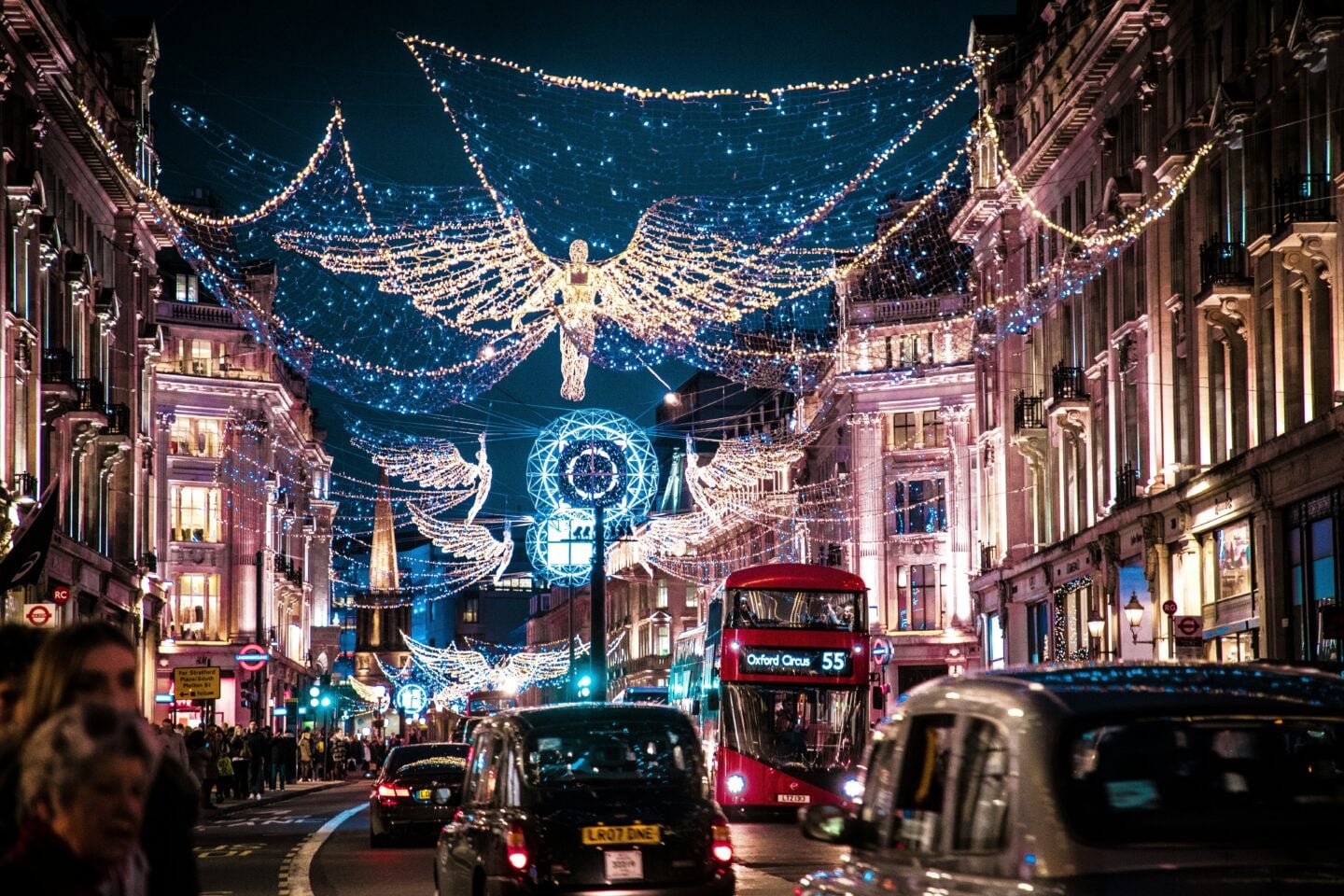 Oxford Street illuminated with Christmas lights and decorations, one of the most iconic things to see in London in winter.