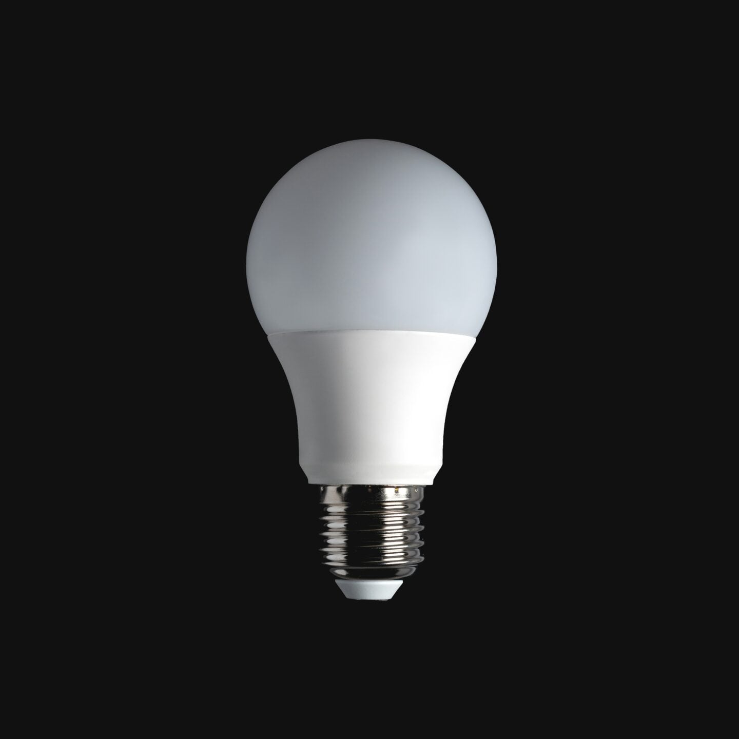 Energy efficient LED light bulb isolated on a black background