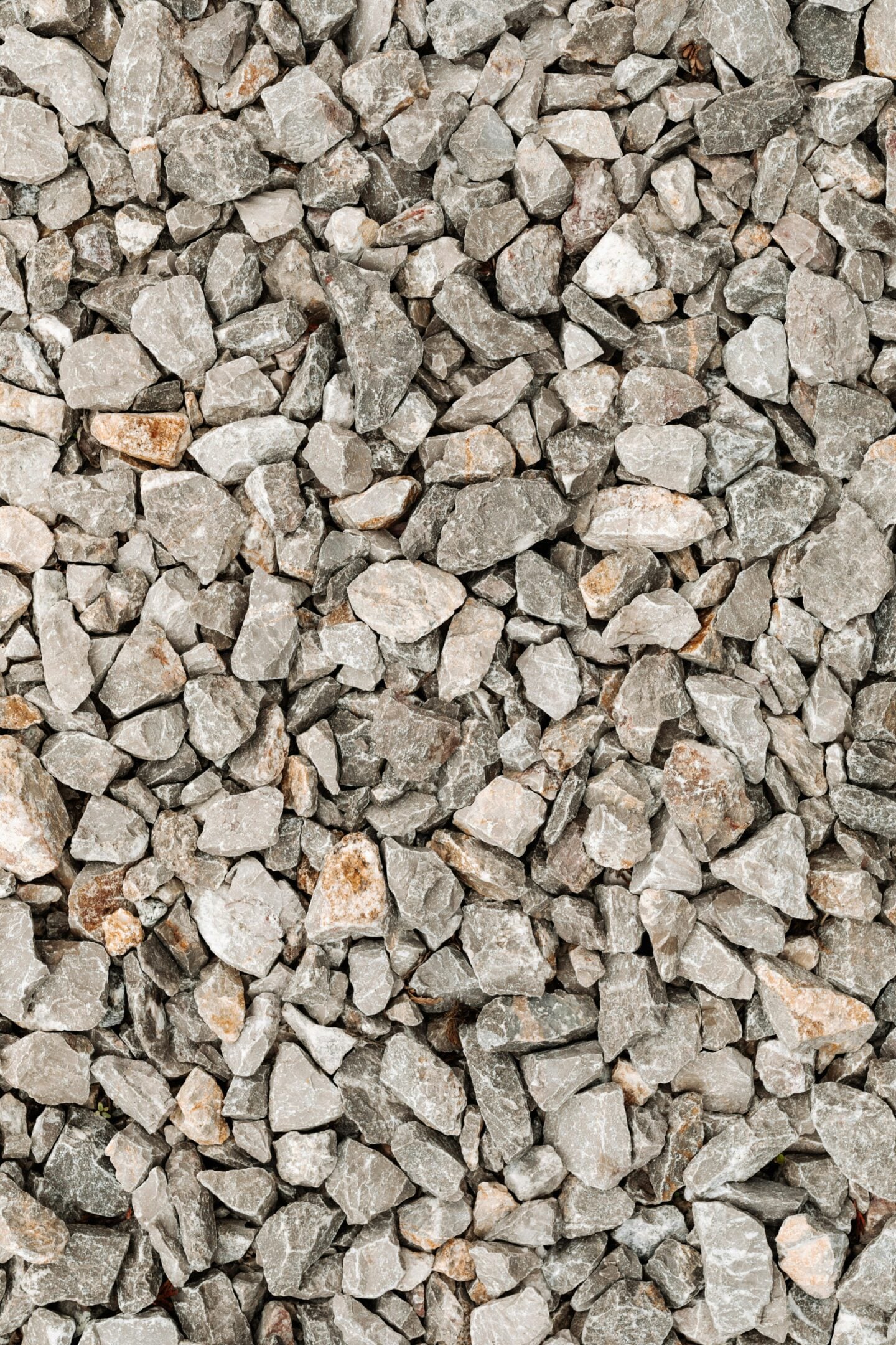 Close-up texture of gray gravel stones.