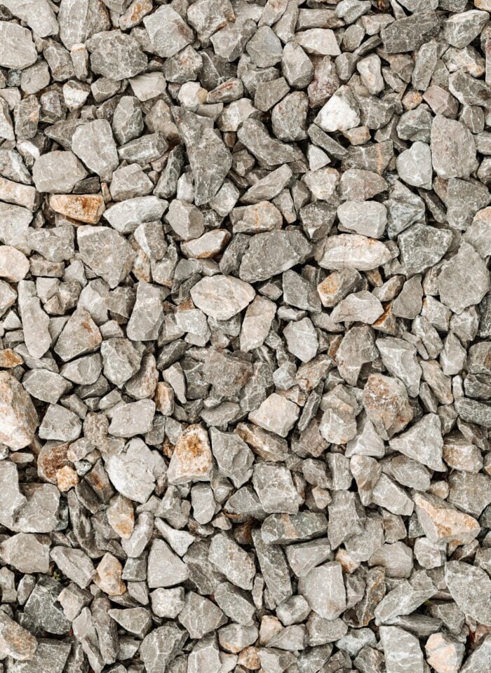 Close-up texture of gray gravel stones.