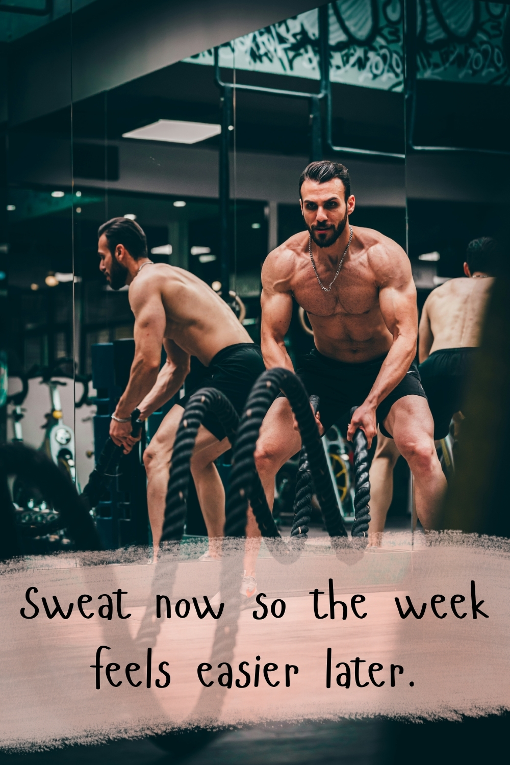 Man training with battle ropes in a modern gym with the quote “Sweat now so the week feels easier later.”