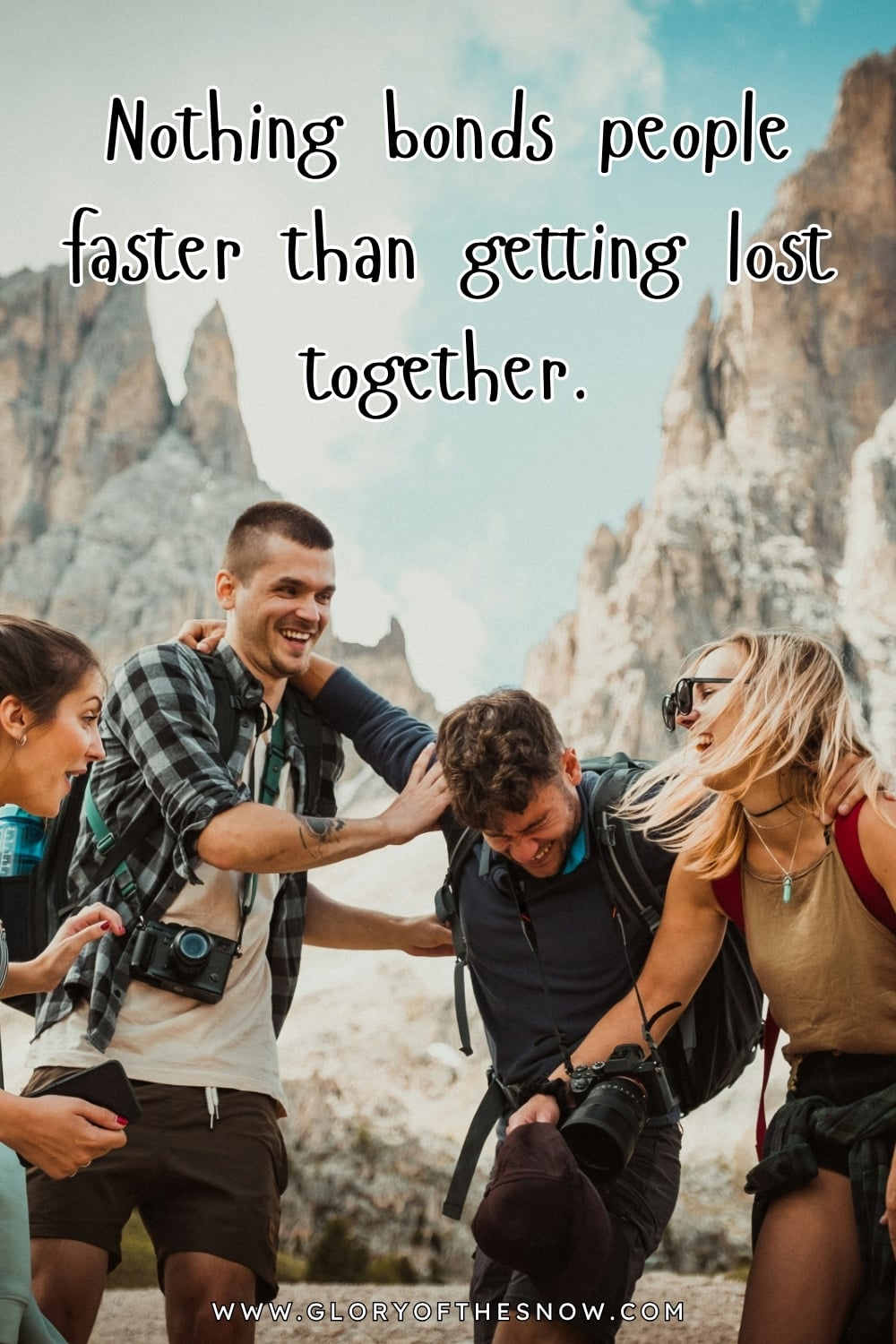 A group of hikers laughing together in the mountains with backpacks and cameras, featuring the funny hiking quote “Nothing bonds people faster than getting lost together” about friendship and shared hiking adventures.