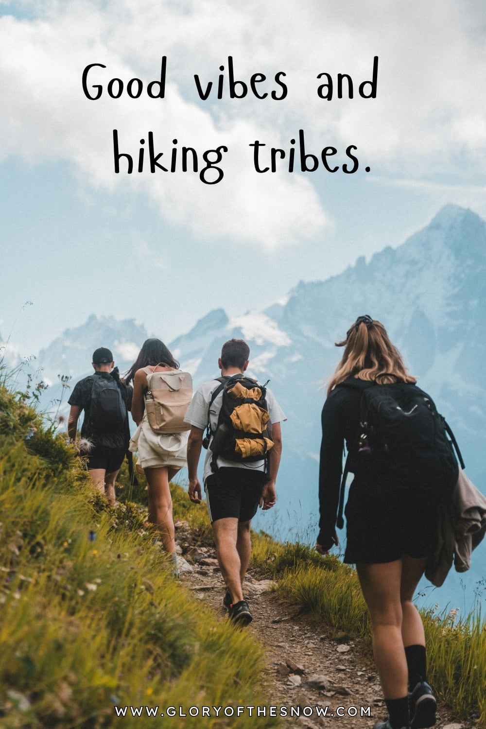 Friends hiking along a scenic mountain trail with dramatic alpine views in the background, featuring the quote “Good vibes and hiking tribes” about hiking with friends and enjoying nature together.